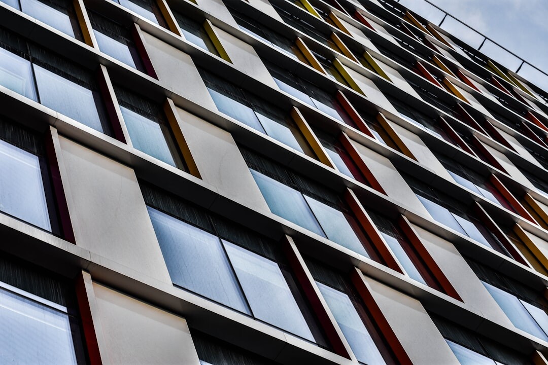 Modern office building facade in Brussels housing a media training center