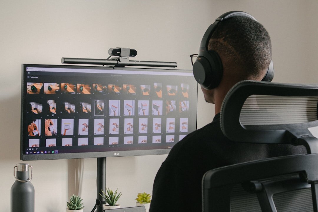 Video editor working on footage timeline at an editing workstation